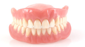 dentures or dental implants