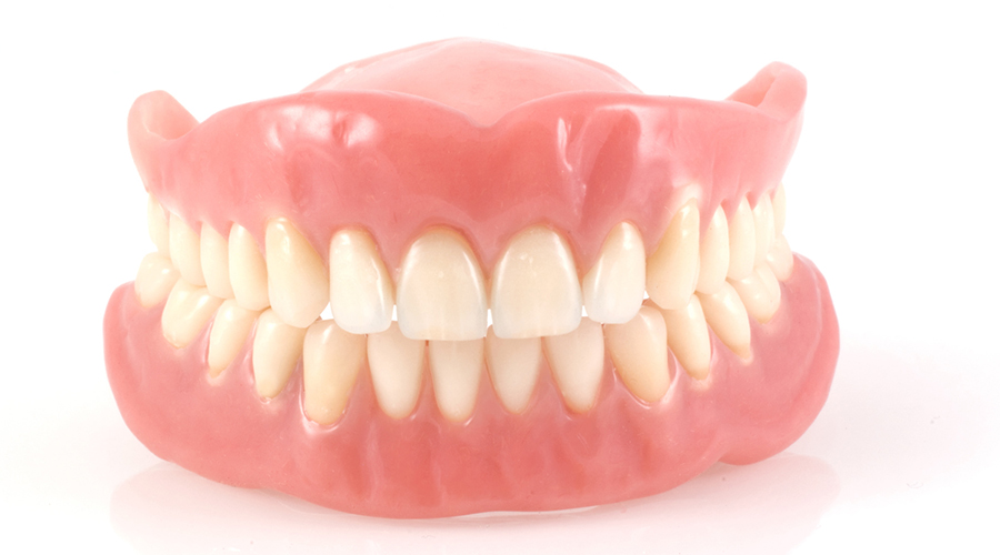 dentures or dental implants