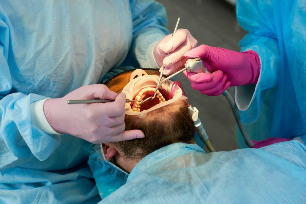 Close-up of a man with a beard during a reception at a dentist.
