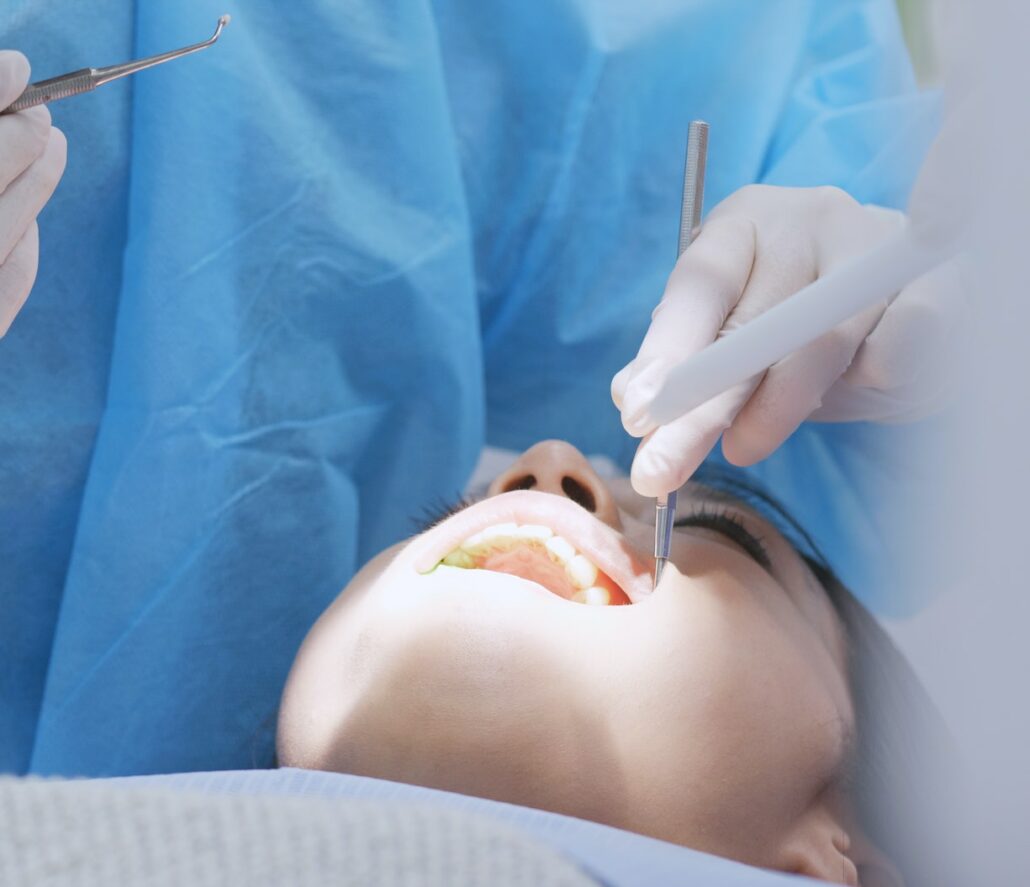 Dentists produce teeth cleaning patient